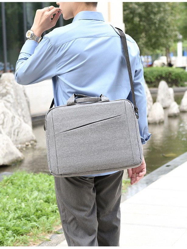 La nueva versión coreana del bolso de computadora de moda, bolso de hombro único para mujeres, mochila portátil ligera y multifuncional para hombres image 5
