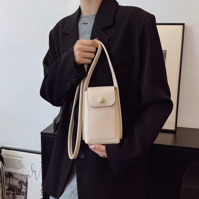 Bolso de teléfono móvil de moda coreana 2025 verano nuevo bolso femenino casual con patrón de lichi bolso de hombro simple y versátil bolso de mensajero