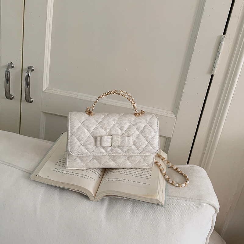Bolso de mano de alta calidad para mujeres 2026 nuevo nicho de lujo ligero arco bolso cuadrado de textura cadena mochila de hombro