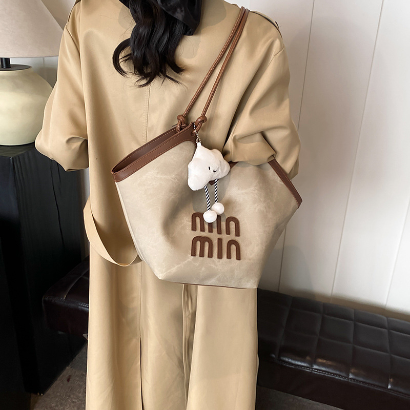 2024 nueva bolsa de gran capacidad para mujeres, bolso de hombro Sen Meng, bolso de diseño de nicho, bolso de viaje de alta calidad para mujeres