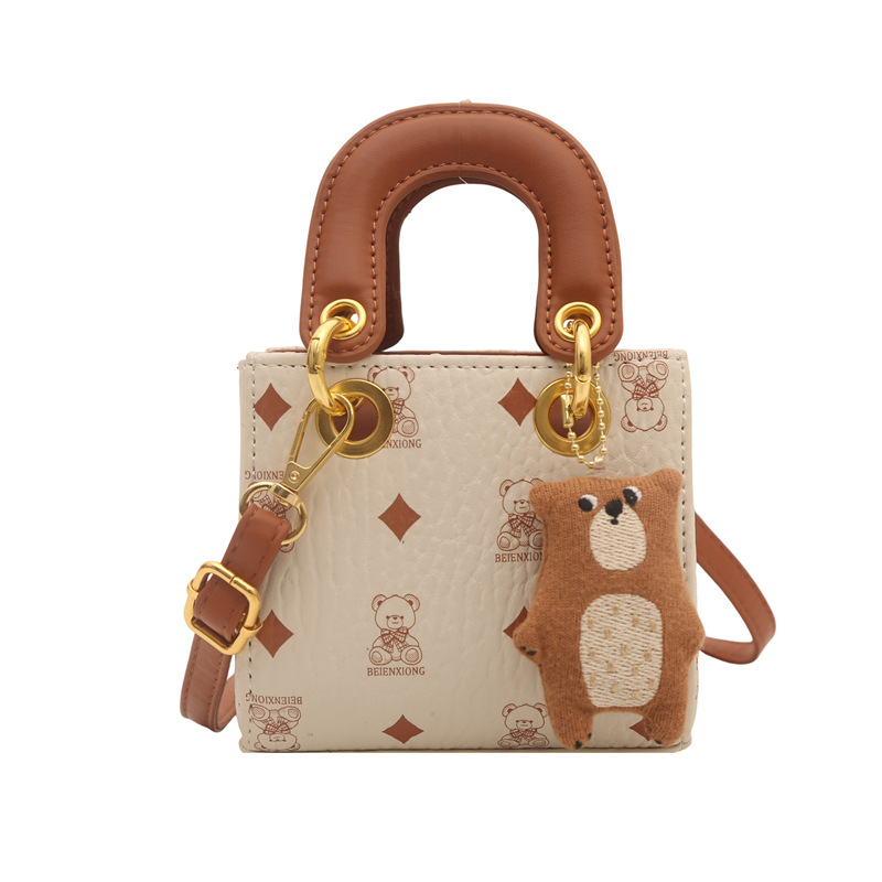2026 nuevo bolso infantil caricatura lindo oso impresión bolso de hombro de moda mini bolso de bebé