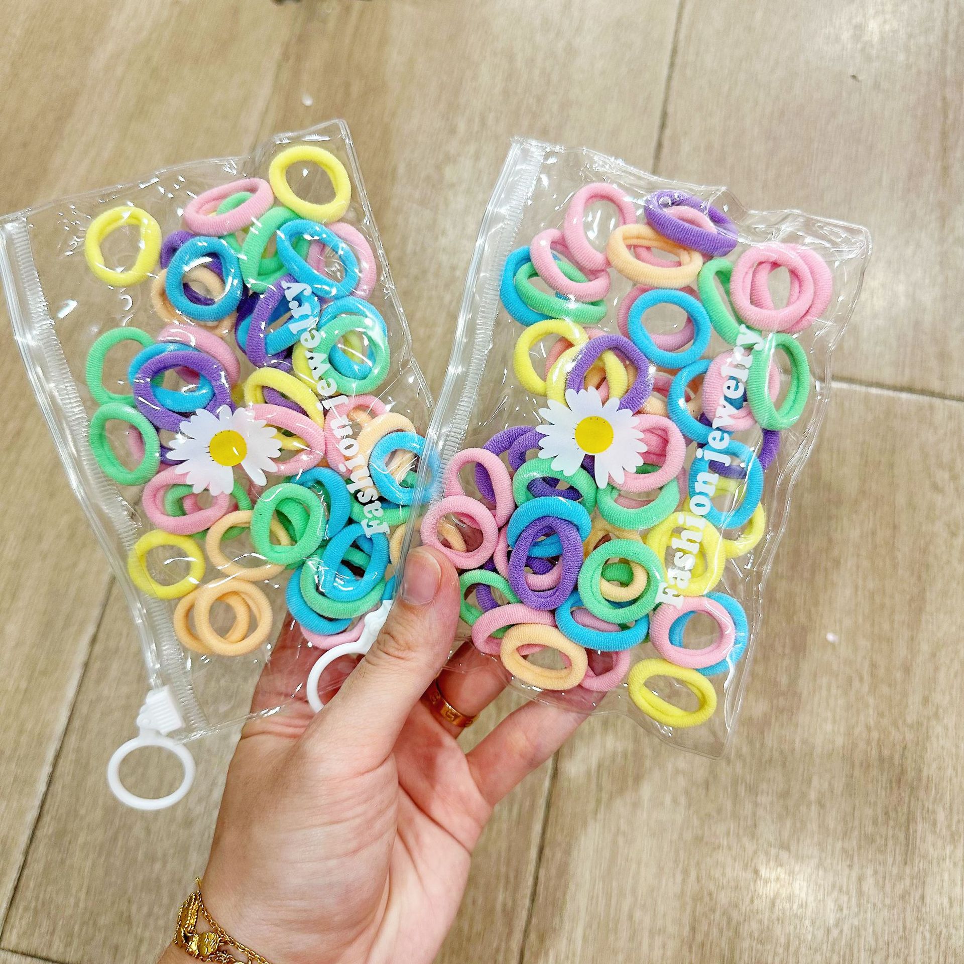 Mini cabeza de princesa en caja, clip de agarre pequeño, clip de flequillo, horquilla rota en la frente, banda elástica para niños, no daña el cabello, anillo del pulgar al por mayor image 99