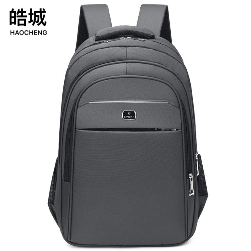 Spot wholesale nueva mochila de gran capacidad para hombres mochila simple para computadora de negocios mochila para estudiantes de ocio al aire libre