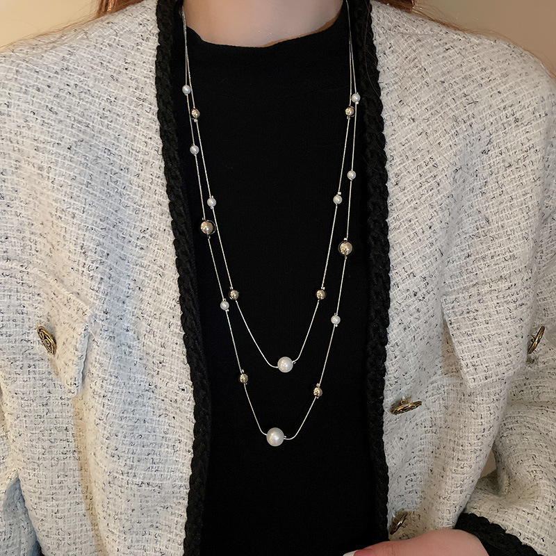 Luz de lujo largo multicapa apilados collar de perlas Otoño e Invierno versátil suéter clavícula cadena nicho de alta calidad accesorios al por mayor
