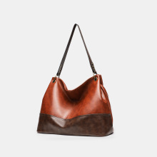 外贸包包女2025秋季新款欧美复古风拼接拉链款单肩包大容量托特包