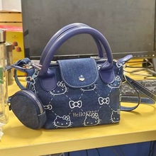 可爱洋气牛仔印花小猫手提包女2025新款时尚单肩斜挎包迷你饺子包
