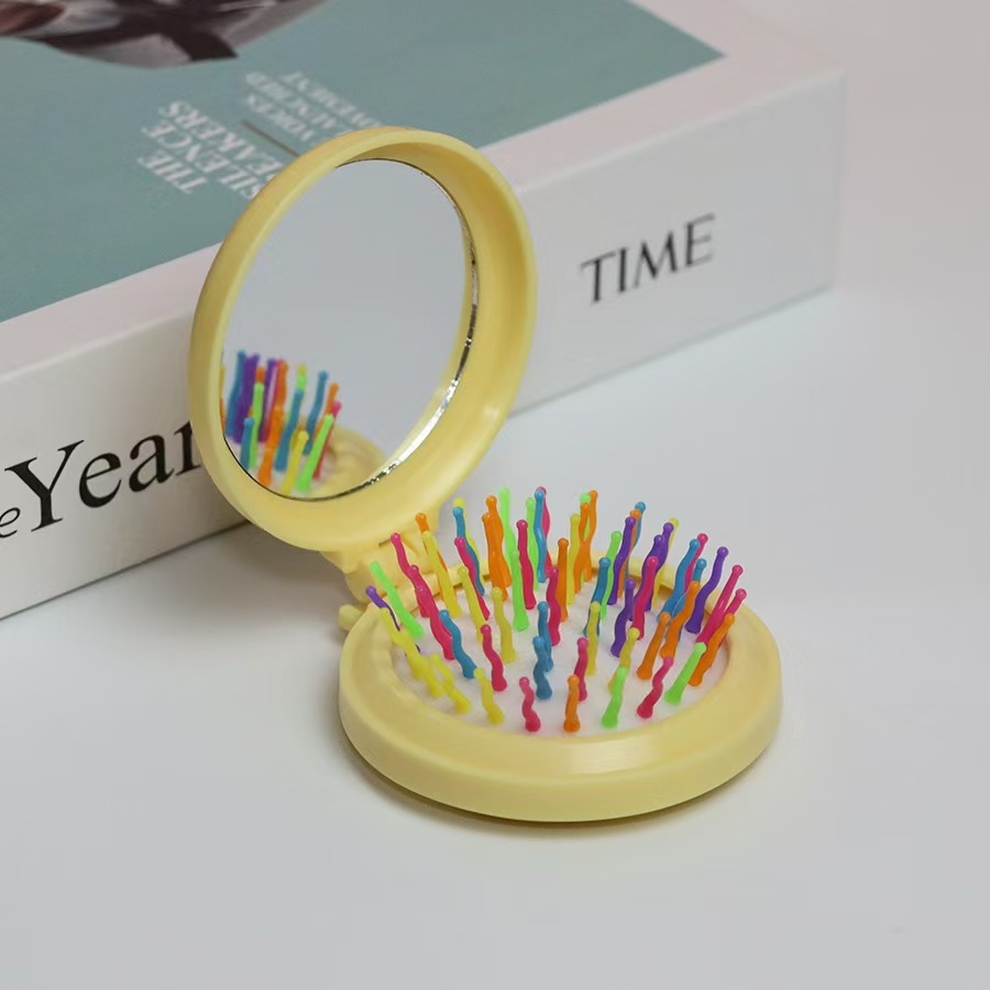 Airbag plegable Pequeño peine con espejo de maquillaje DIY adorable cojín de aire de niña cabeza de masaje portátil peine espejo todo en uno