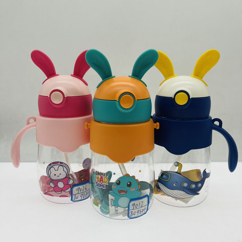 Weilong 9012 espacio taza de agua de dibujos animados de impresión de plástico niños Orejas de conejo de aprendizaje taza de beber con mango taza de paja