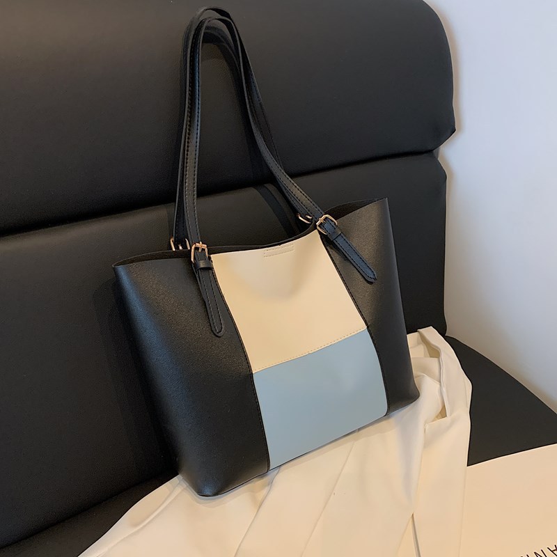 Bolso de cercanías atmosférico para mujer, estilo occidental de gran capacidad 2025 verano nuevo estilo retro simple bolso portátil de un solo hombro para mujer