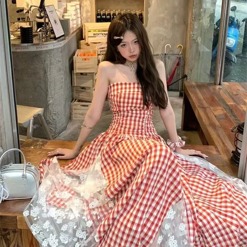 Дизайнерское чувство тяжелой промышленности кружевное сшитое платье в клетку с подтяжкой 2025 лето новое тонкое платье длинное платье женское прилив