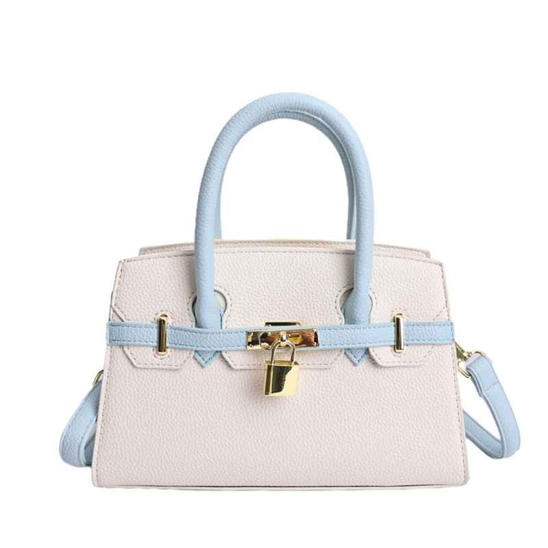 Coreano simple bolso de mano mujer 2026 primavera nueva bolsa de viaje diario texturizada bolso de mochila