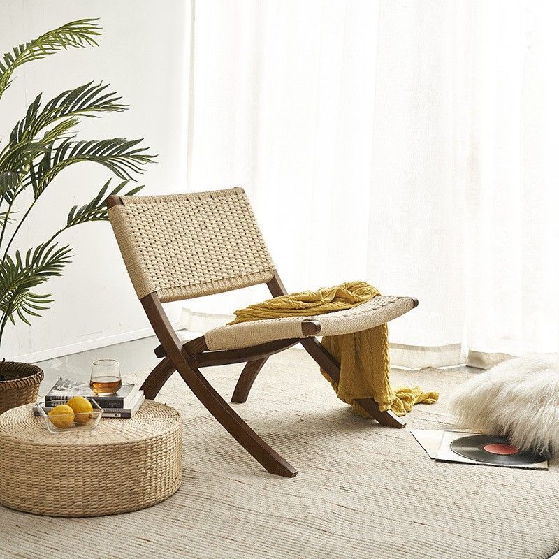 Una silla de silla de madera sólida nórdica sofá retrógrado individual de alojamiento residencial hotel silla de tejido casual