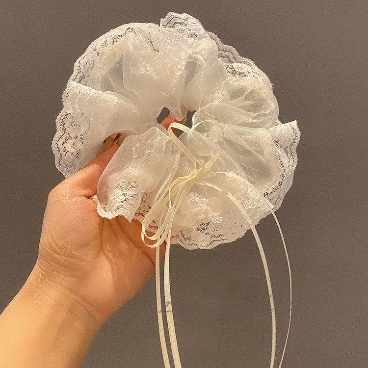 Corea del Sur Dongdaemun Mermaid Jiaxian encaje arco intestino grande círculo femenino nicho dulce cuerda de cabeza temperamento adornamiento de cabello super inmortal