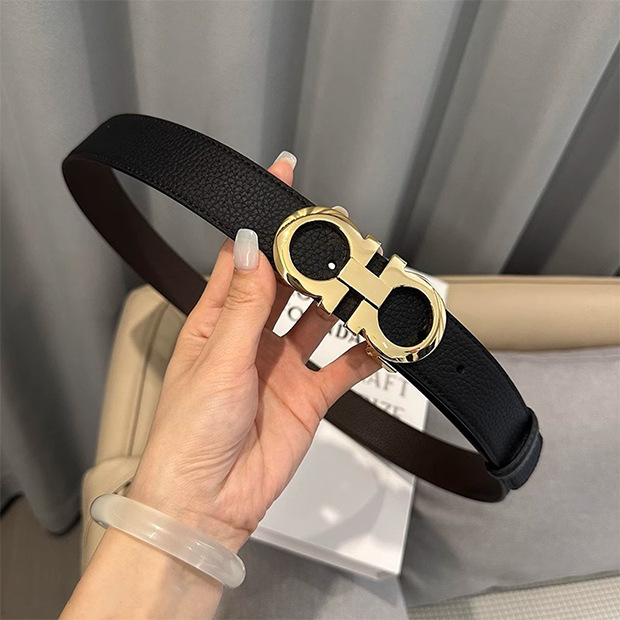 Black stitched pebbled gold buckle