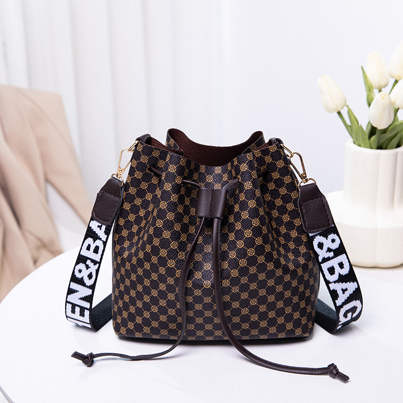 2022 verano nuevo bolso de hombro de moda de mujer bolsa de cubo de flores casuales bolsa de mujer comercio exterior transfronterizo bolsa de mujer bolsa al por mayor