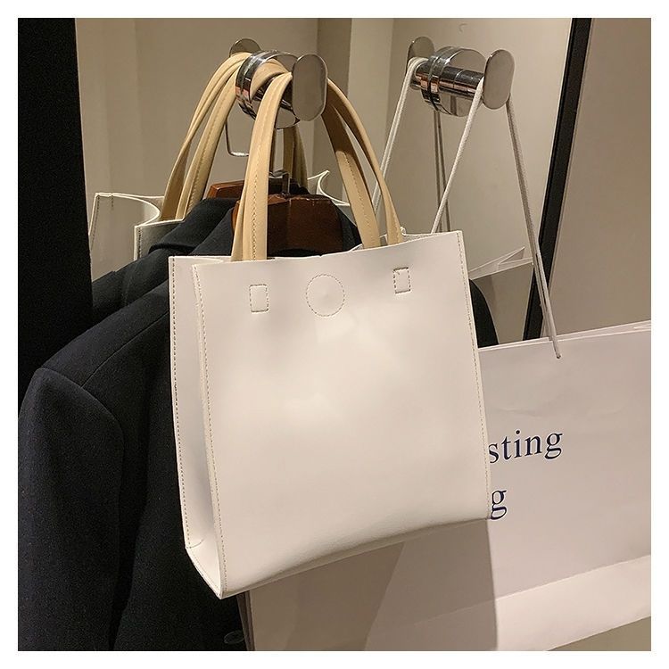 2024 New Bags Korean Version Versatile Commuting Bags Large Capacity Portable Tote Bag Temperament Popular Women’s Bag Vertical Style_voghion.com