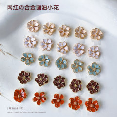 ネット赤二重合金花ネイルアクセサリー新立体金色レースツバキの爪アクセサリー卸売り
