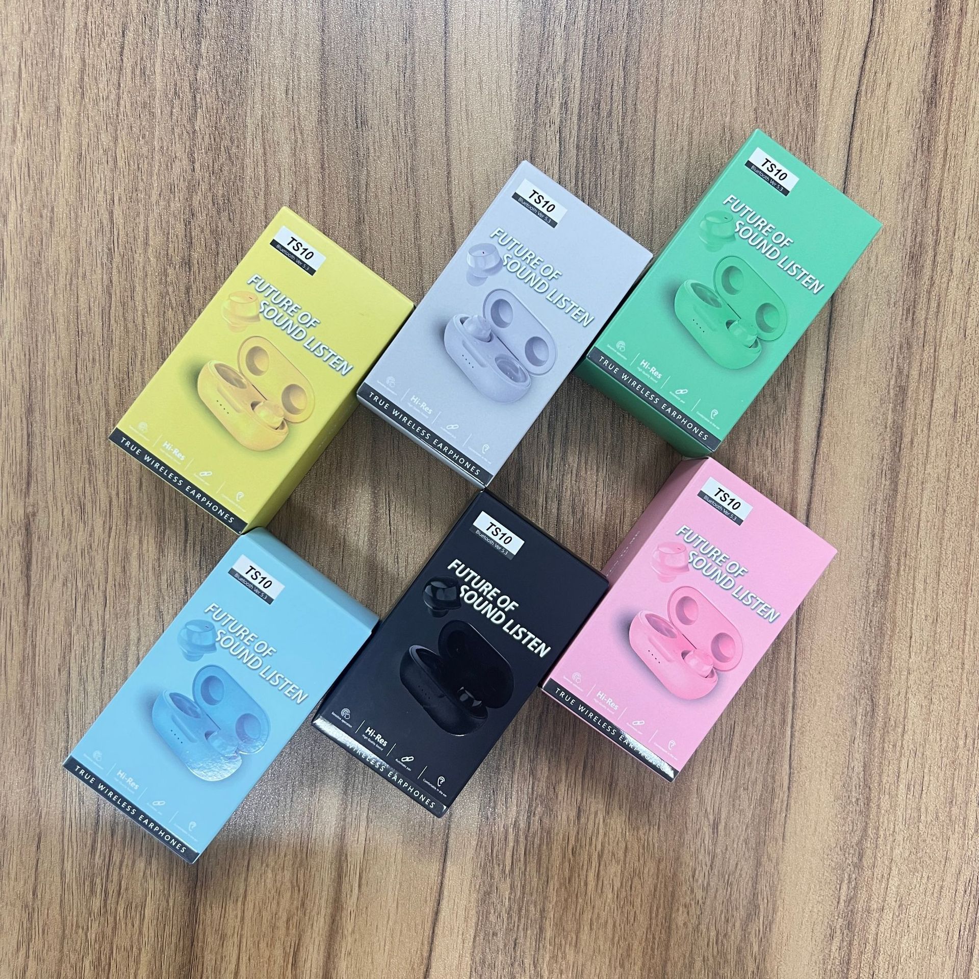 Transfronterizo nuevo TS10 macaron inalámbrico en la oreja los auriculares Bluetooth deportes auriculares de color al por mayor etiqueta engomada del pelo código de barras