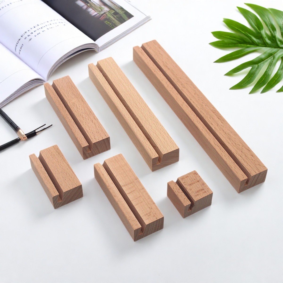 Wooden business card holders, modern minimalist postcard holders, and calendar bases available for direct factory sale.