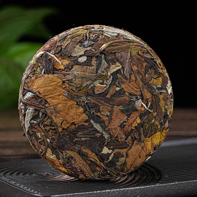 El origen explosivo de Yunnan se suministra directamente al por mayor té Pu 'er té de primavera 100 gramos de pastel Li yiwuman Rosin dulce té blanco