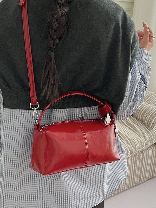 Transfronterizos de alta calidad de tela de cera de aceite bolso de almohada de mano para mujeres 2026 nueva moda lujosa ligera versátil mochila