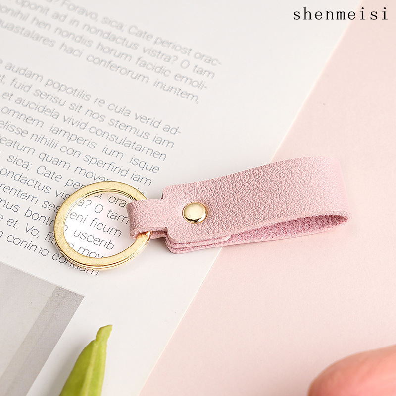 Keychain de cuero pu transfronterizo estilo simple de mano hebilla de cuero logotipo imprimible colgante de cuero llavero para hombres y mujeres