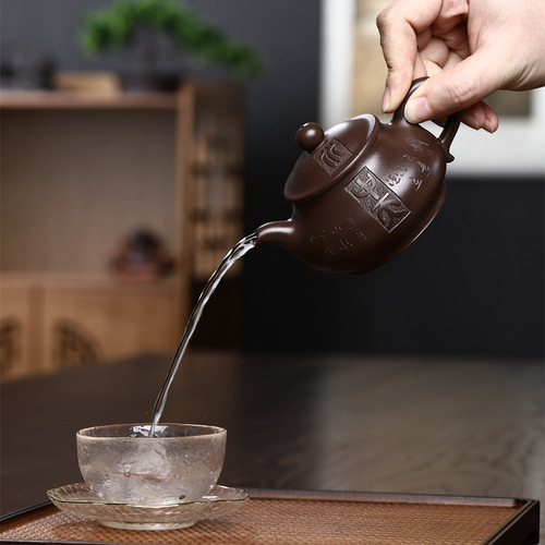 Wholesale Yixing all-pure handmade stone yellow purple sand pot ancient carved Pan pot easy to brew teapot Kung Fu tea set