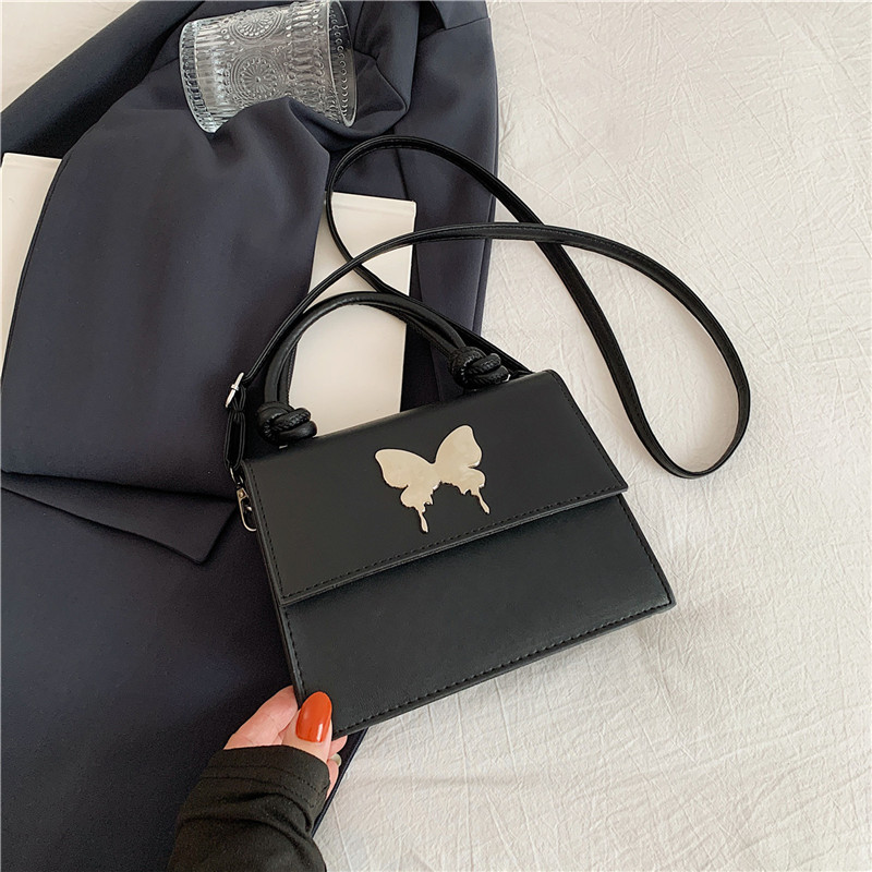 Diseño de nicho de lujo ligero bolso de mano de este año popular arco decoración de viaje diario mochila de hombro para mujeres