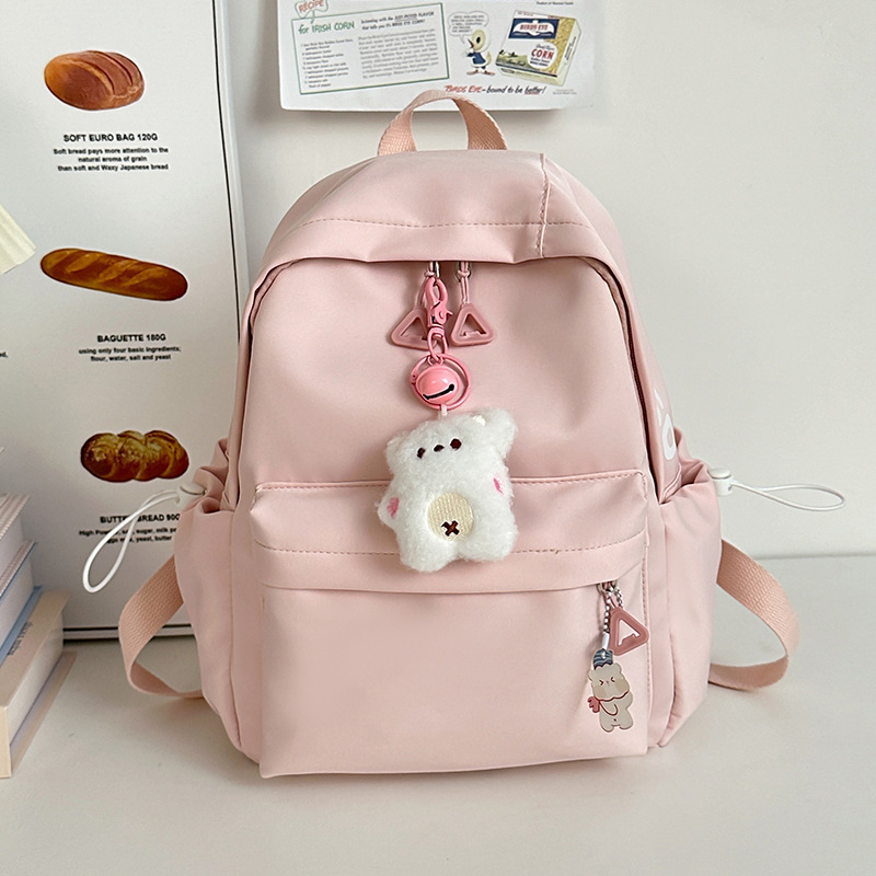 Mochila de gran capacidad para estudiantes de secundaria femenina simple y versátil para estudiantes de secundaria japonesa mochila de diseño