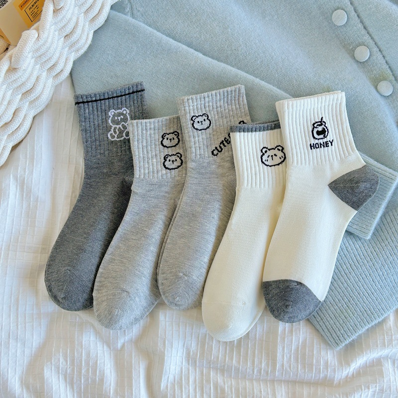 Calcetines de mujer de primavera y verano a media pantorrilla longitud calcetines de mujer japoneses lindos divertidos ojos grandes expresión a media pantorrilla medias de sueño fábrica al por mayor