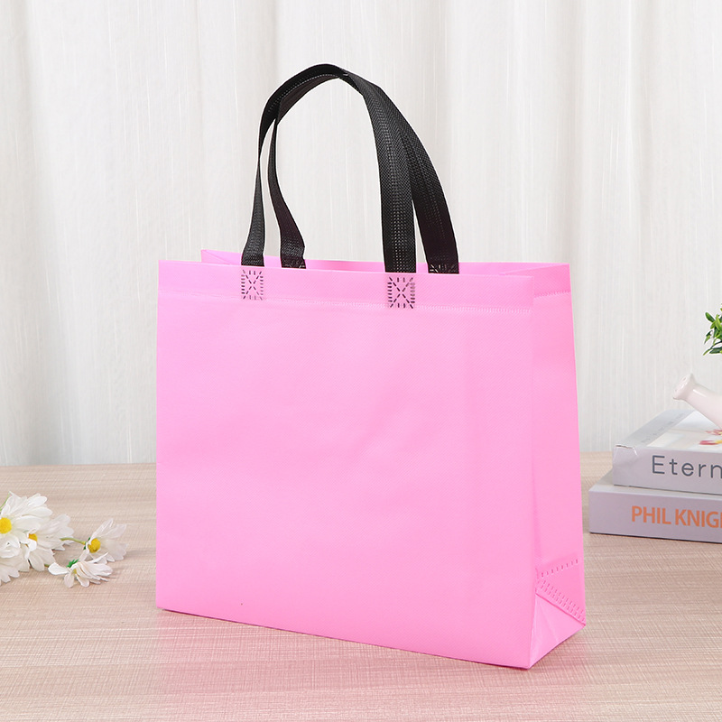 Bolsa de mano no tejida de color spot bolsas de compras de mano en blanco engrosadas logotipo publicitario impresas bolsas no tejidas image 2