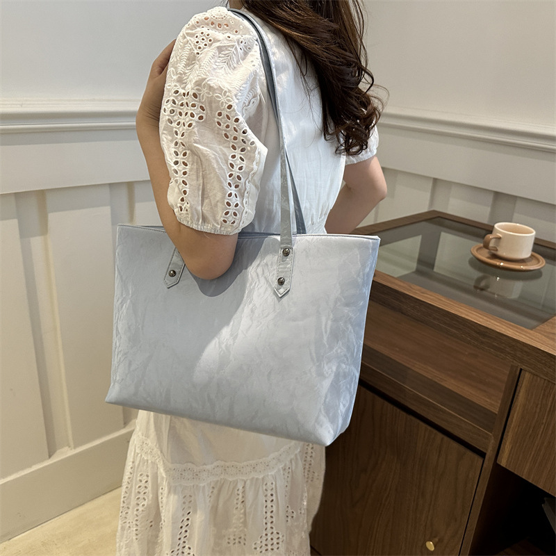 Bolsa de viaje de clase de estudiantes para mujeres 2024 nueva moda primavera hombro brazalete bolsa de alta capacidad de gran tamaño bolsa de mano