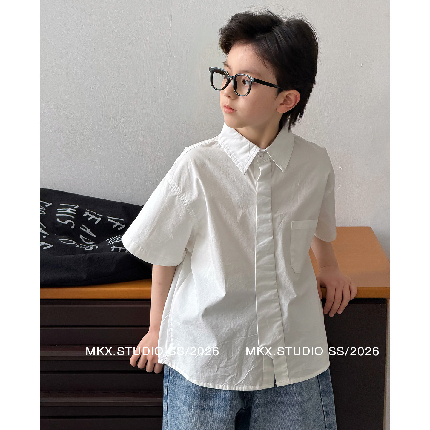 Camisas de mangas cortas para niños 2026 ropa infantil de verano nuevo estilo coreano ropa de verano para niños camisas mayores al por mayor