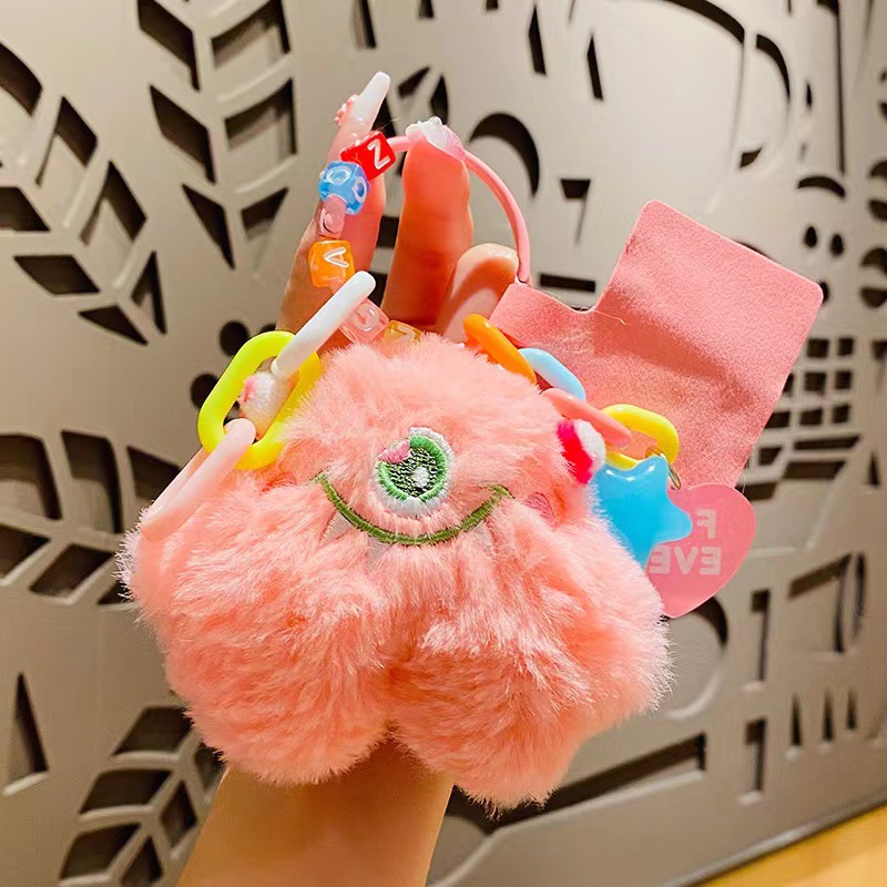 [Venta caliente] genuino de peluche monstruo coche llavero par colgante de teléfono móvil colgante bolsa colgante