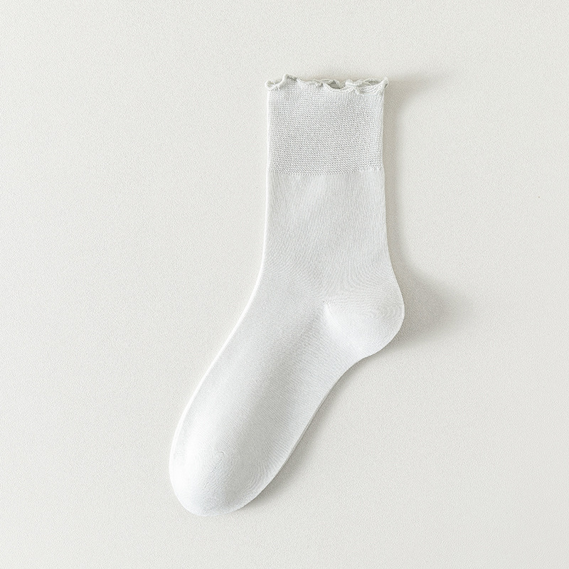 Calcetines de algodón de color sólido para mujeres verano en una máquina sin costuras de hueso envasado independiente calcetines de mujer al por mayor