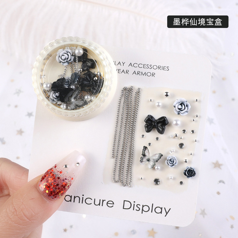 2023 nuevos accesorios de manicura camellia material paquete cadena de mariposa rosa arco mezcla combinación