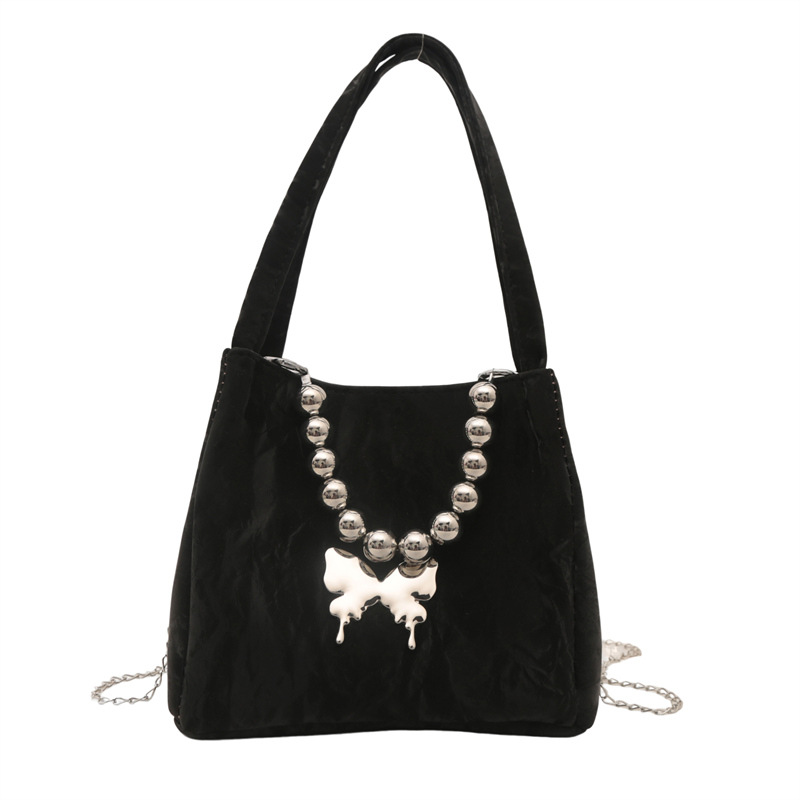 Alta sensación de lujo ligero bolso de cubo axilar 2024 verano nuevo estilo de moda arco de cuentas cadena de hombro mochila