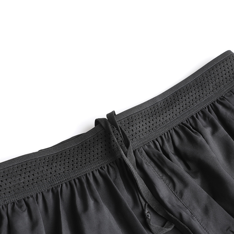 Pantalones cortos deportivos para hombres y mujeres maratón de larga distancia transpirable forro de secado rápido entrenamiento de fitness anti-exposición tres pantalones sin costuras