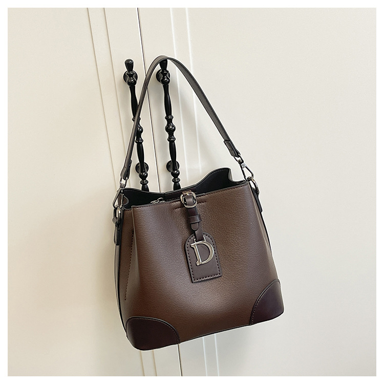 Bolso de nicho retro, bolso de moda, bolso de balde, mujer 2025, nuevo estilo de estilo extranjero, bolso de hombro, bolso de mochila coreano