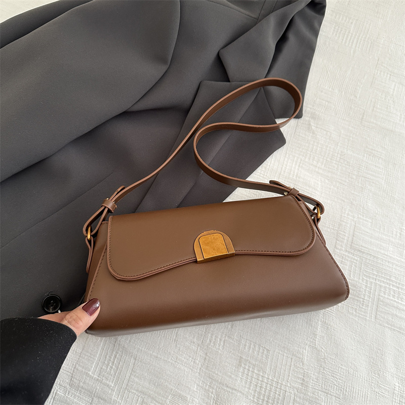 Bolso de brazo retro de palo para mujeres 2025 nuevo nicho de moda de alta sensación bolso de hombro universal bolso de mochila