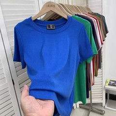 ヨーロッパの商品の新型の大きいサイズの純色のゆったりした弾力のねじの半袖のtシャツの女性の底のシャツの上着のファッション的な緑色の小さいシャツ