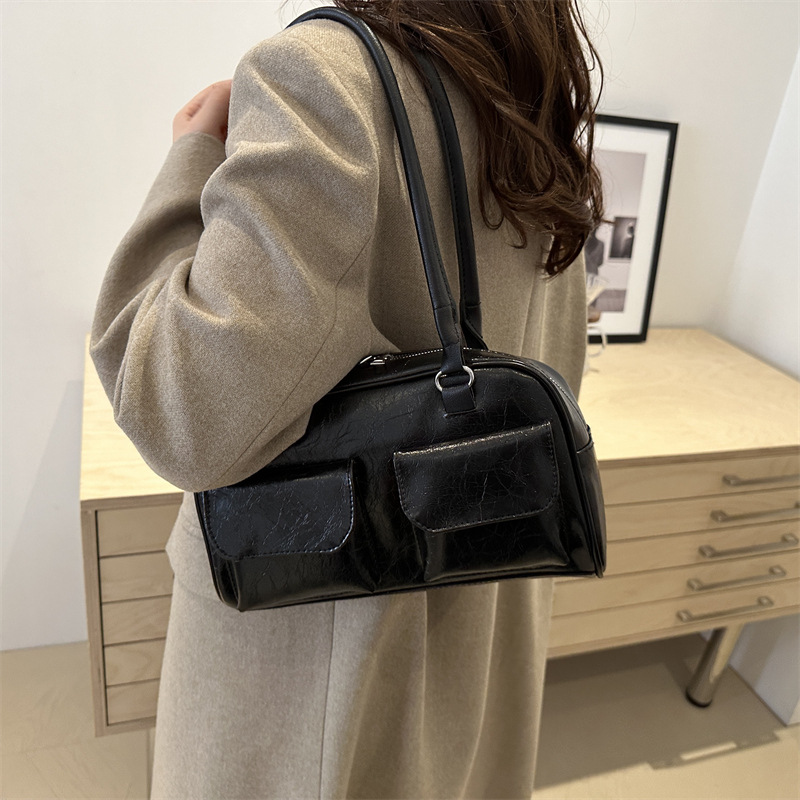 Bolsos para axilas de gran capacidad para viajeros otoño e invierno nueva moda retro nicho bolso de hombro casual de varios bolsillos