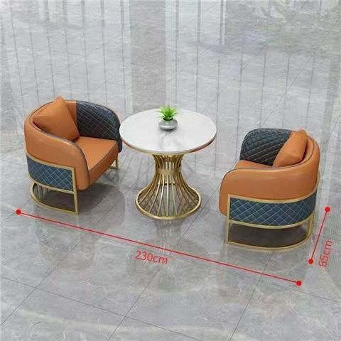 One table and two chairs orange