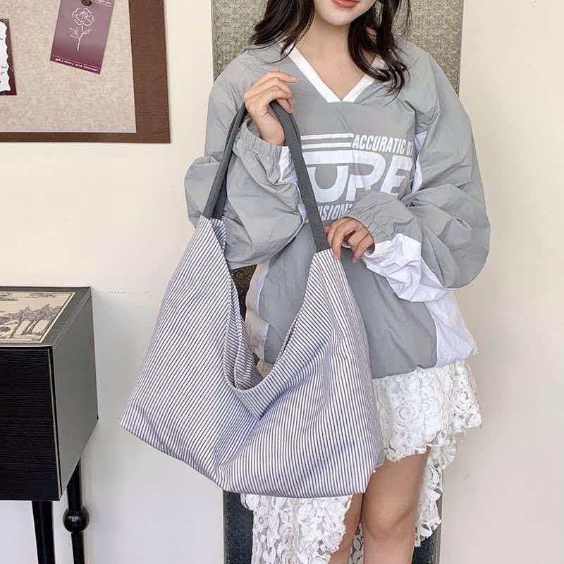 Capacious underarm bag
