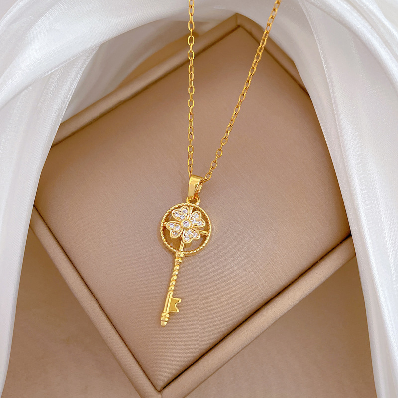 Luxurious Rotating Lucky Key Necklace With Full Diamond Inlay_voghion.com