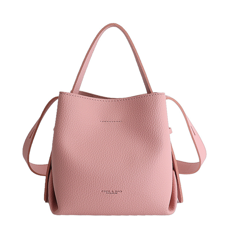 Bolsa de cubo de mano coreana 2026 nuevo nicho diario bolso de cubo bolso de mujer gran capacidad de transporte de viaje mochila