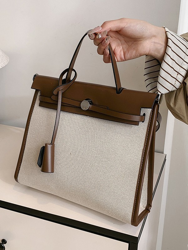 Bolso Carey Tote portátil de alta gama 2025 Nuevo estilo transfronterizo Bolso bandolera de gran capacidad de contraste de lona