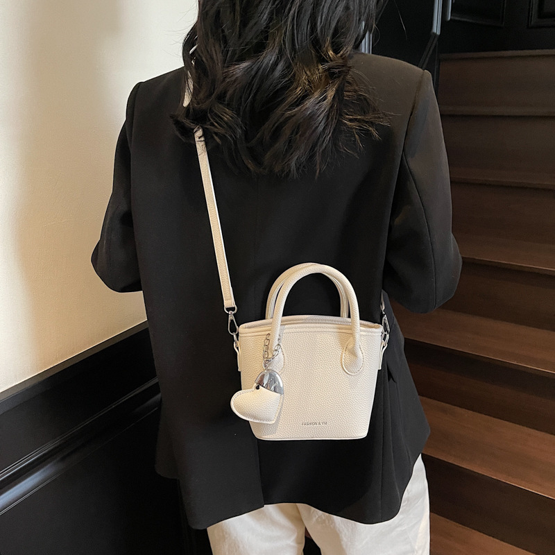 Comercio exterior super fuego mano llevar bolso pequeño mujer 2025 nueva moda todo-fósforo bolso bandolera simple tendencia estilo occidental