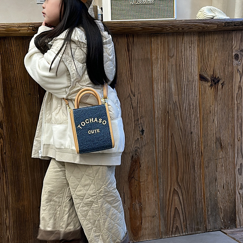 Bolsas de estilo coreano para niños y niñas letras extranjeras estilo mini bolsas de mochila para bebés 2025 nuevas bolsas de comercio exterior para niños