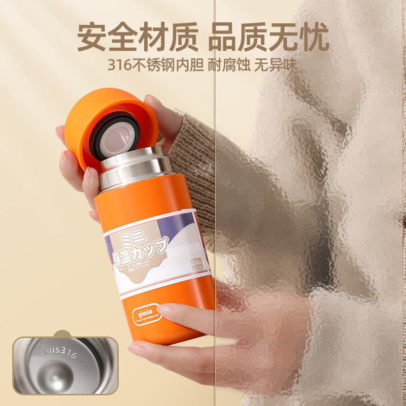 真空断熱ステンレスカップ304 ハンドル付き 弾丸型 ポータブル マカロンカラー 保温カップ 百貨店卸売|undefined